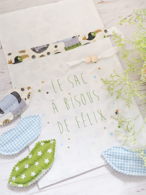 Sac à bisous blanc, Vert et bleu avec un motif d'animaux de la jungle enfantin