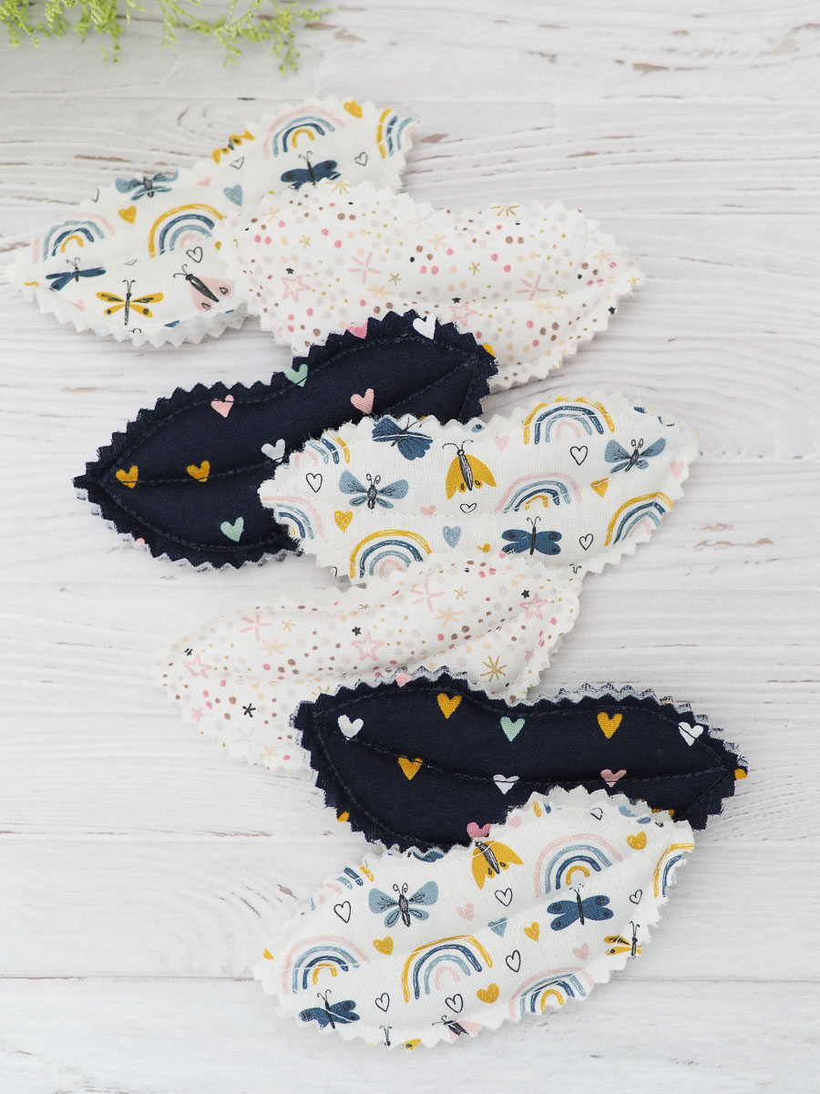 bisous en tissus motif papillons coeur et libellules