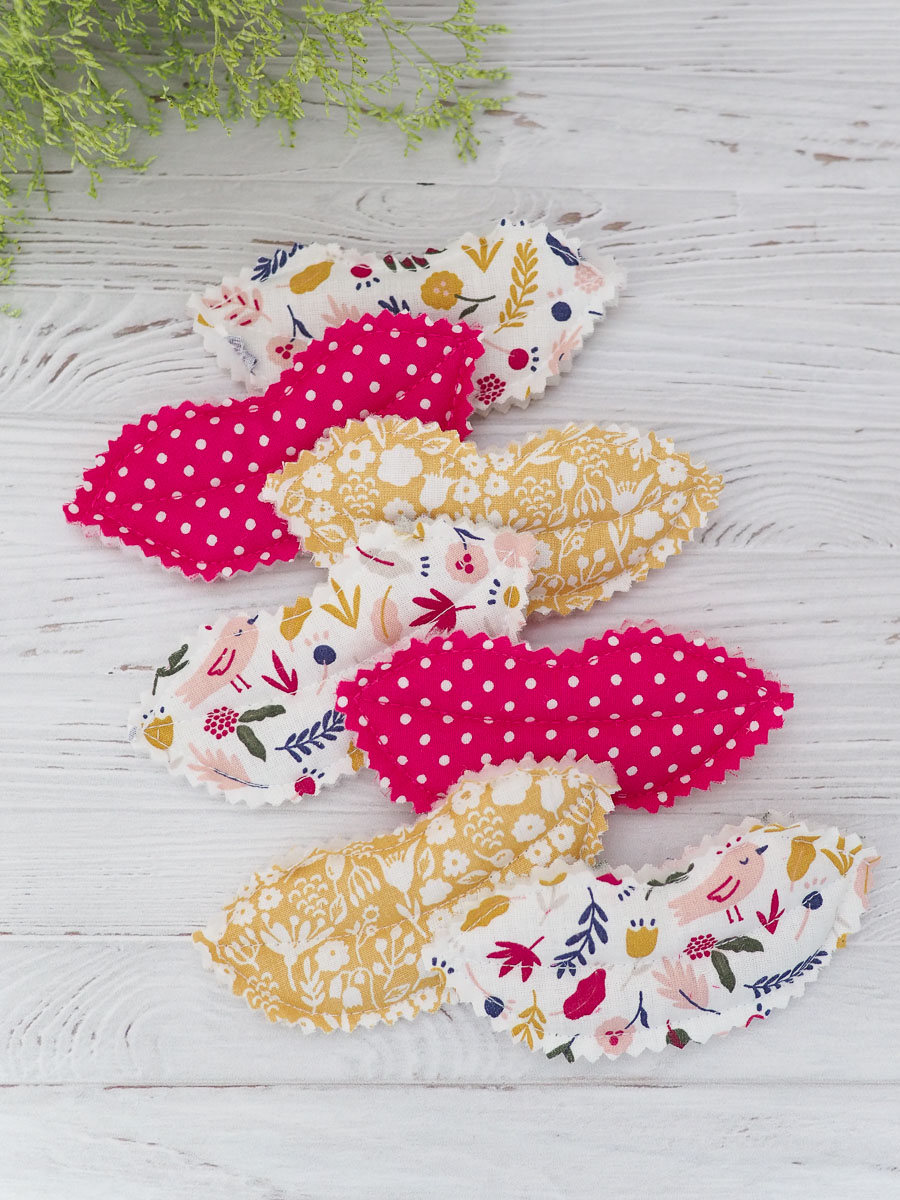 lot de 7 bisous en tissu motif enfantin rose jaune et beige